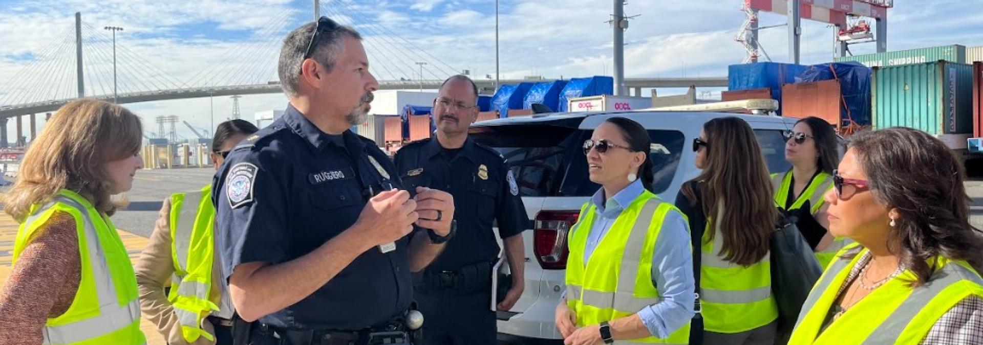 Rep. Sharice Davids with Customs and Border Patrol agents at the Long Beach Container Terminal