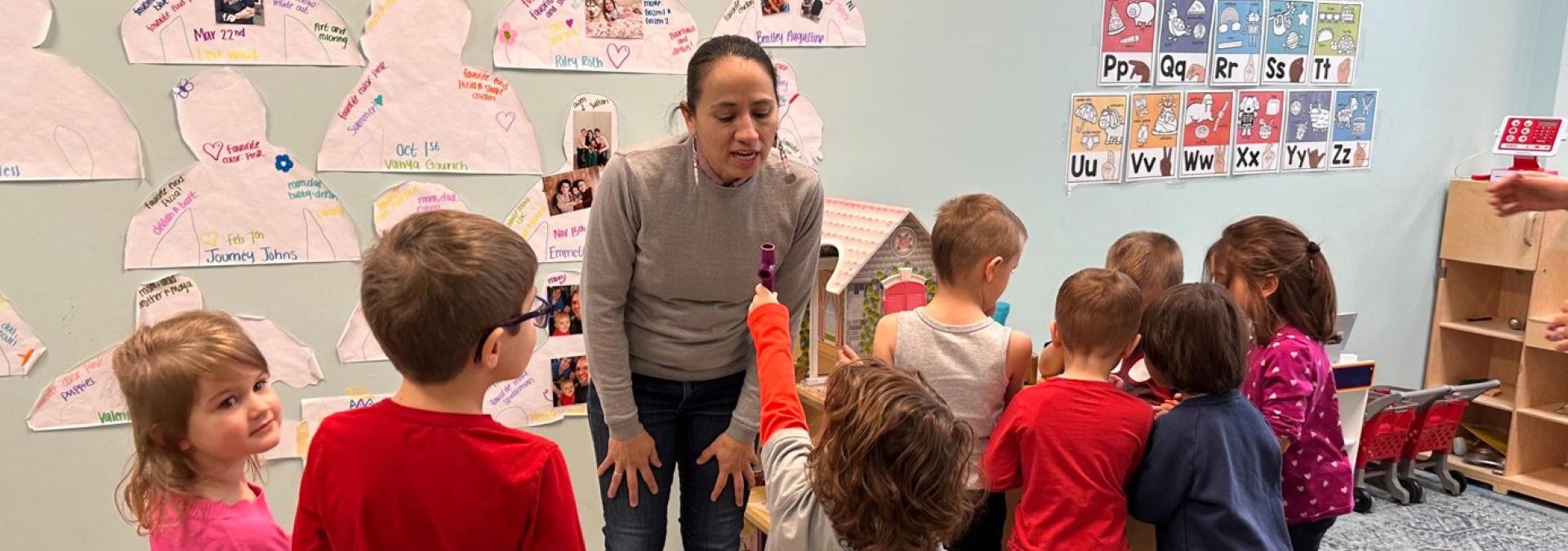 Rep. Davids in a classroom with students.