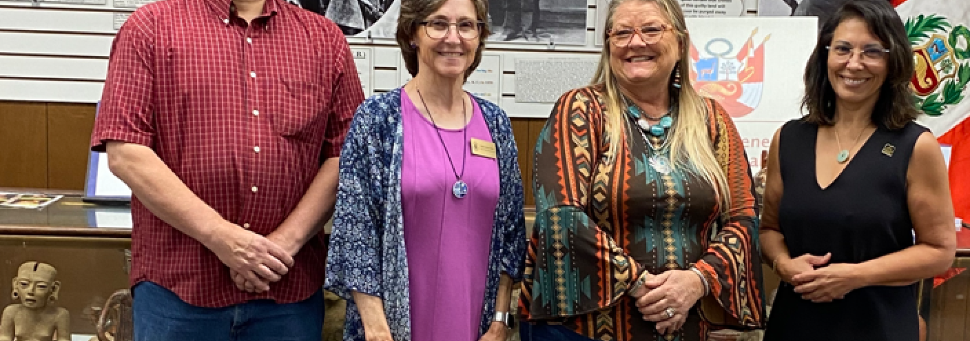 Gordon Geldhof (Miami County Museum Executive Board), Paula Cutter-Mark (Rep. Davids' Community Liaison), Jana Barcus (Miami County Historical Museum President), with Liliana Trelles, representative of the Peruvian Embassy representative receiving 3 pre-Columbian artifacts from the Miami County Historical Museum.