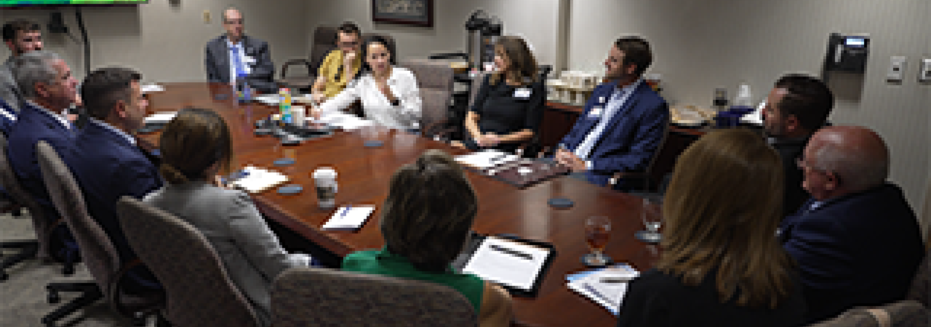 Rep. Sharice Davids and health care professionals at a roundtable event in Paola, Kansas.