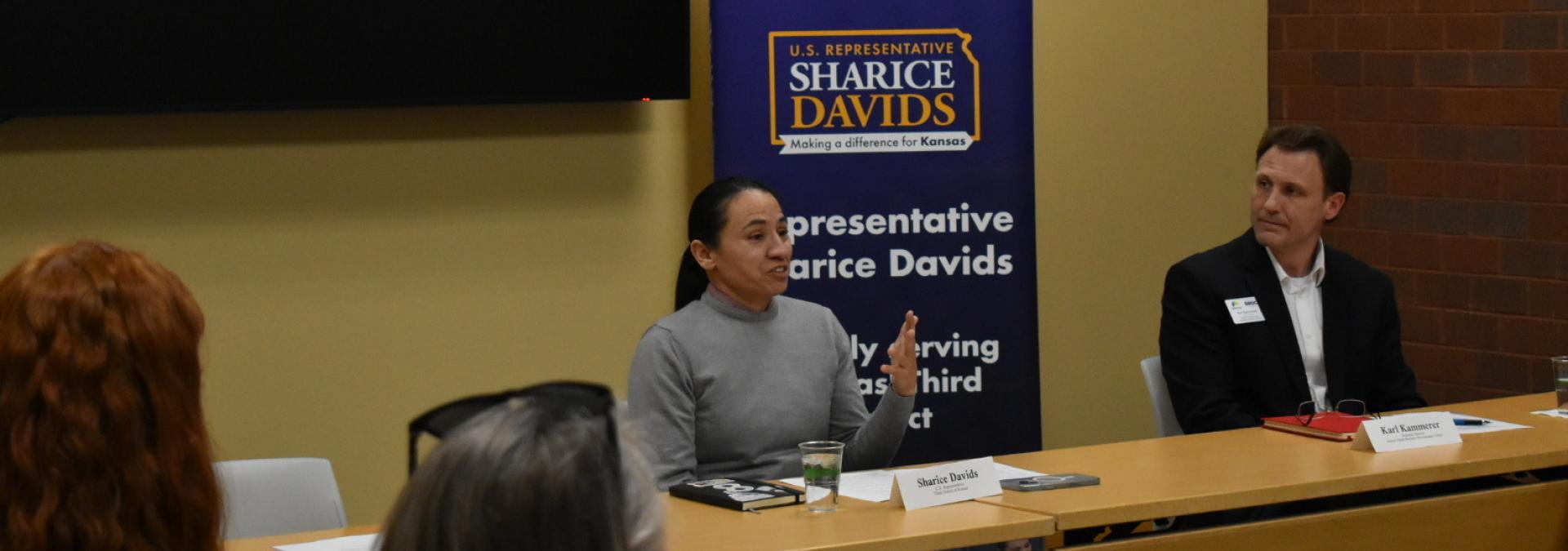 Rep. Sharice Davids speaking at her small business roundtable in Johnson County