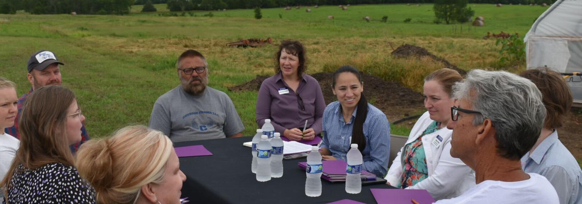 Rep. Sharice Davids at Courage Farms speaking with local producers.