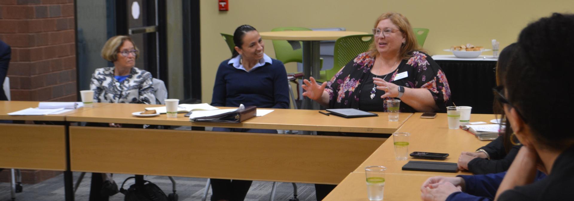 Rep. Sharice Davids speaks with Kansans during a roundtable on the one-year anniversary of the major domestic manufacturing law.