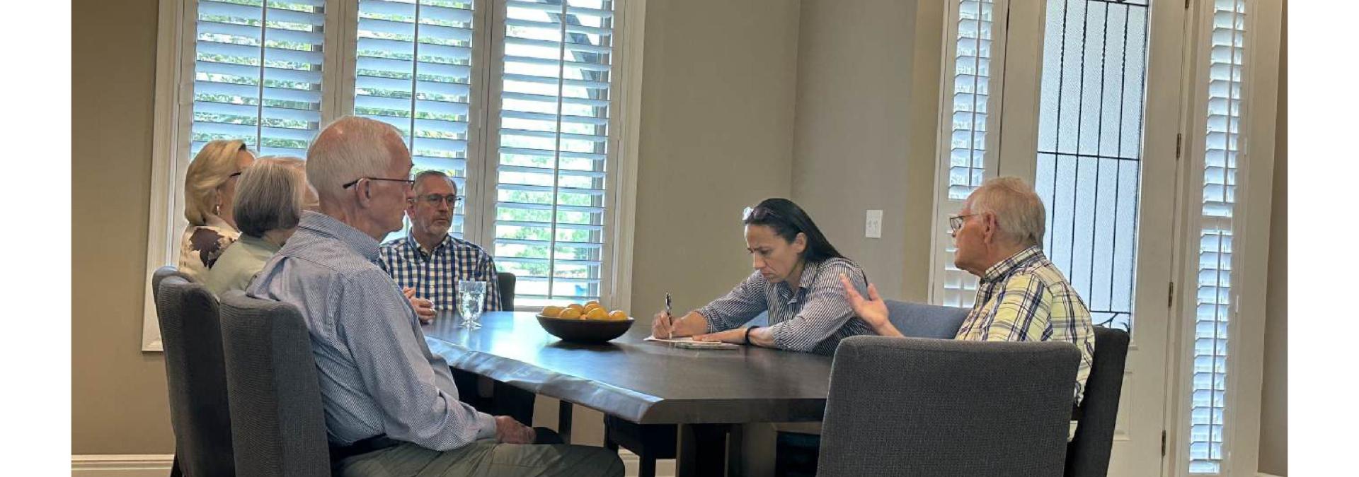 Rep. Davids and local seniors discussing Social Security at a home in Overland Park