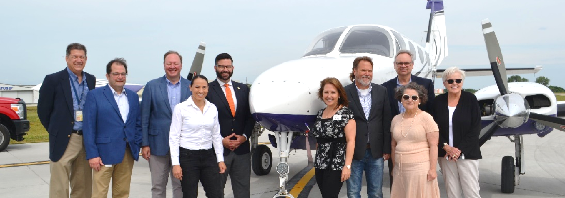 Rep. Sharice Davids, John County leadership, and Johnson County Executive Airport staff.