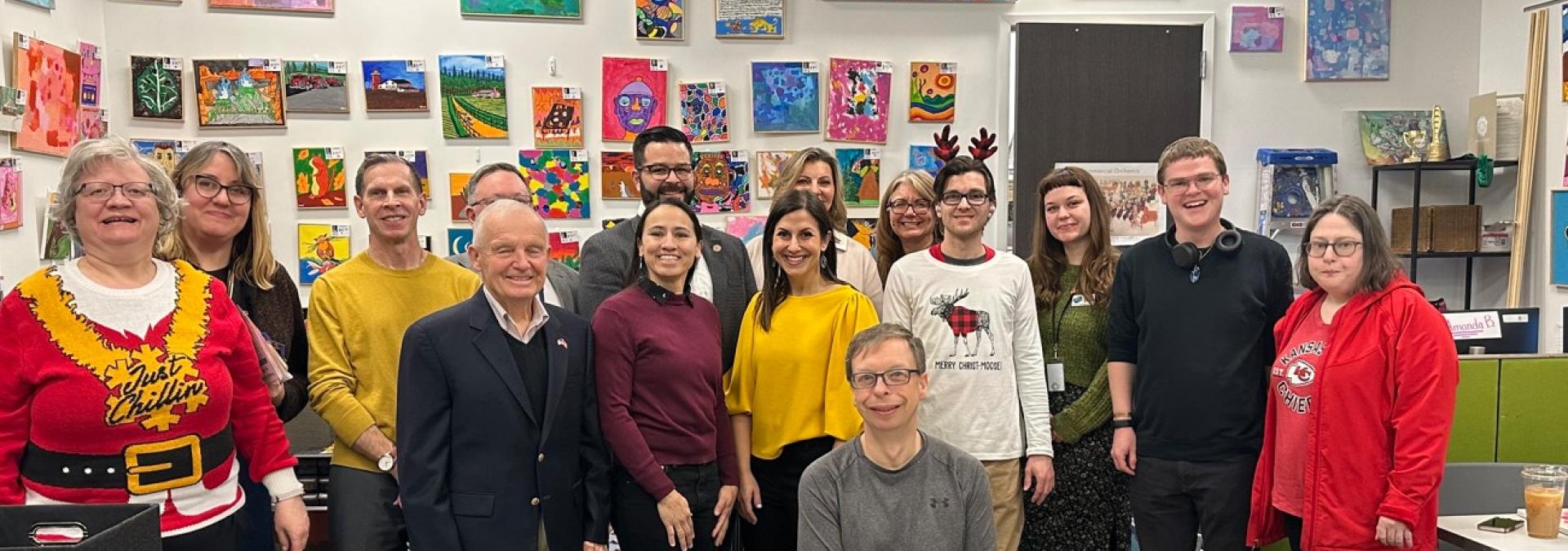 Rep. Sharice Davids with Johnson County leaders and Emerging Artists staff and participants.