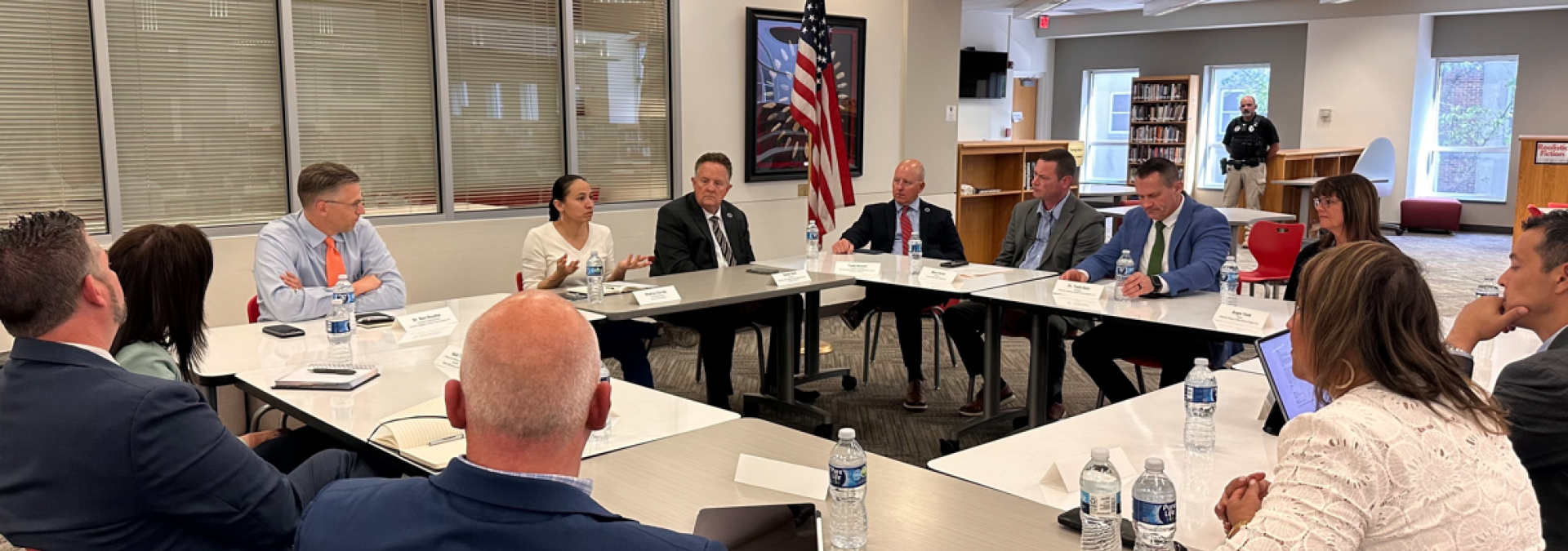 Rep. Sharice Davids and local education professionals at Shawnee Mission North High School.
