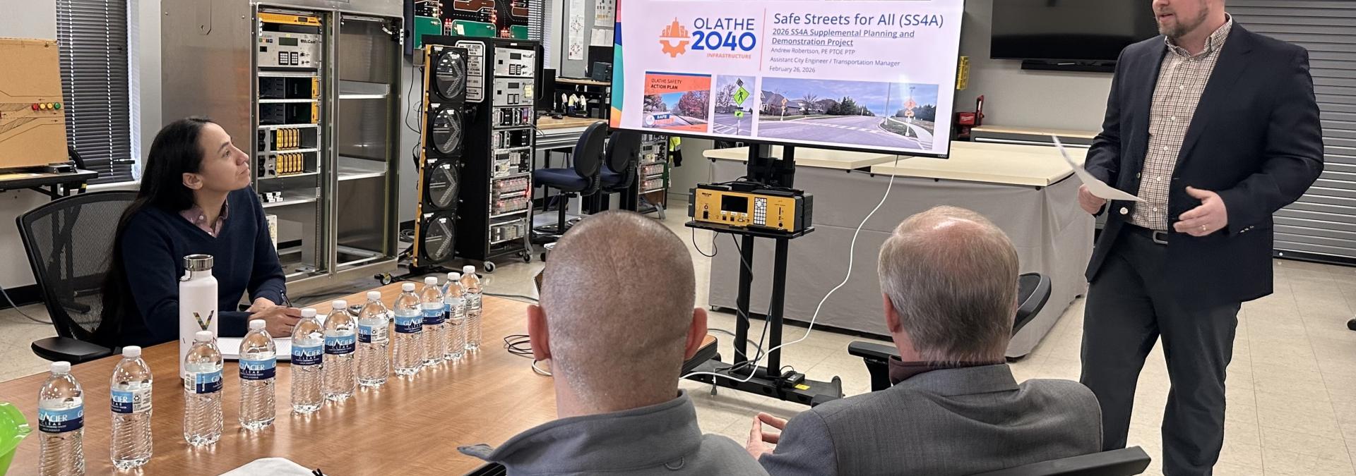 Rep. Sharice Davids and Olathe City officials discussing the Safe Streets for All grant