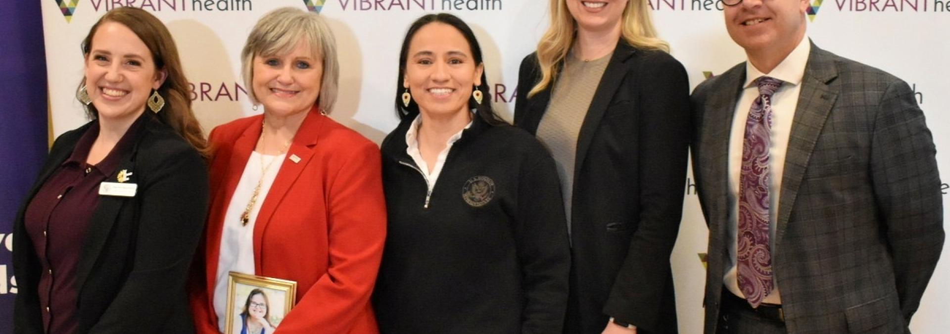 Rep. Sharice Davids and local health care leaders.