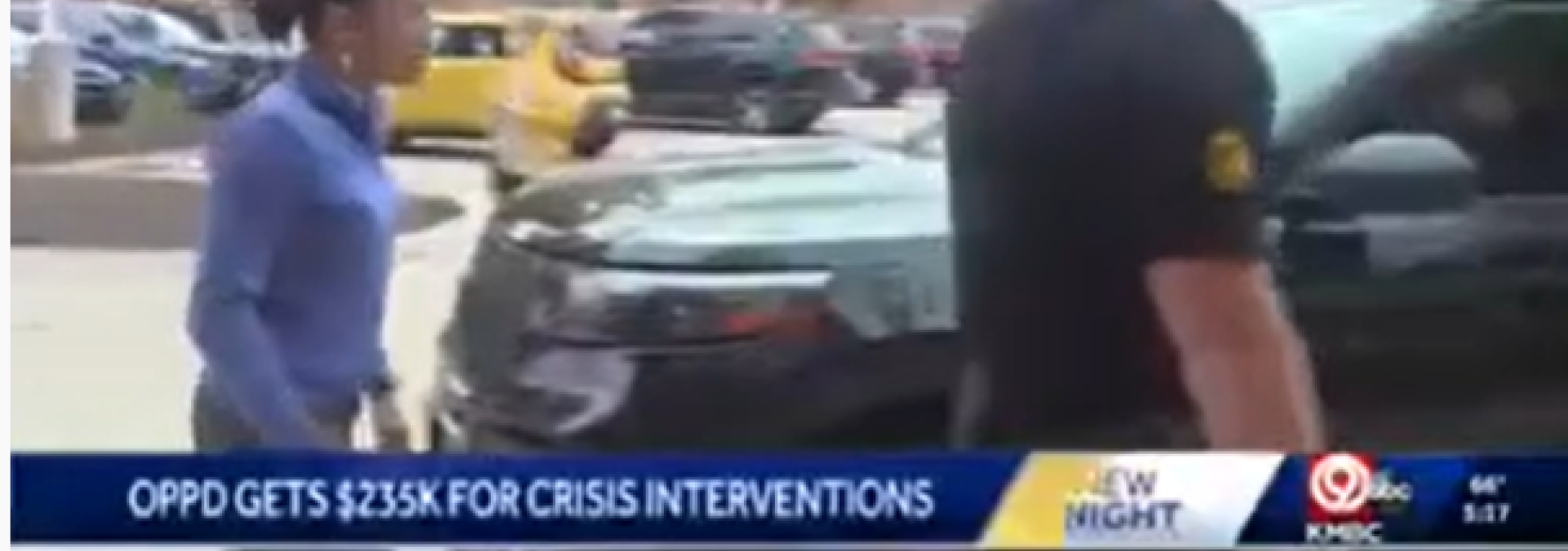 Local newscast with chyron "OPPD gets $255K for crisis intervention"