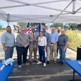 Rep. Sharice Davids with city, county, and state officials celebrating the federal investment for the Kansas Avenue Bridge