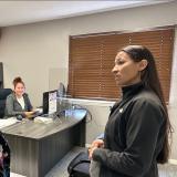 Davids with El Centro staff to learn about their efforts to enroll Kansans in affordable health care.