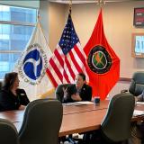 Representative Sharice Davids speaks with aviation staff at the FAA’s Central Region Headquarters.