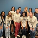 Rep. Sharice Davids with local teens after their conversation on mental health.