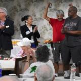 Rep. Sharice Davids with Kansas seniors celebrating new prescription drug savings