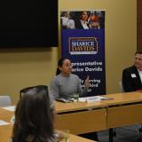 Rep. Sharice Davids speaking at her small business roundtable in Johnson County