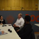 Rep. Sharice Davids speaks with former federal employees fired by DOGE