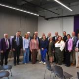 Rep. Sharice Davids and community partners celebrating new projects.