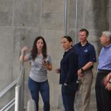 Nicole Woods, a City of Olathe engineering project manager, gives Rep. Sharice Davids a tour of the Renner Pump Station.