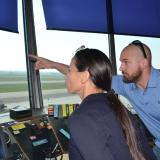 Representative Sharice Davids tours the New Century AirCenter’s 81-year-old air traffic control tower.