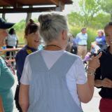 Rep. Sharice Davids and community members conversing 