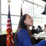Rep. Sharice Davids shakes a constituent's hand
