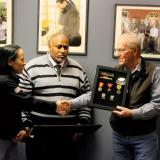 Rep. Sharice Davids returning a Vietnam veteran's service medals in her Overland Park office 