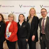 Rep. Sharice Davids and local health care leaders.