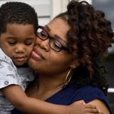 Getty/Katherine Frey    A mother holds her child in Dumfries, Virginia, May 2017.