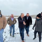 Group of people walking through snow