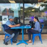 Representative Sharice Davids meeting with a constituent