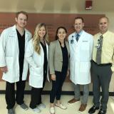 A group of doctors with Rep. Davids