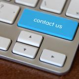 Laptop button says contact us
