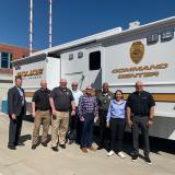 Rep. Sharice Davids in front of the Olathe Police Department’s Mobile Command Post that was approved for federal funding.