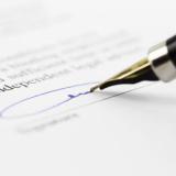 Pen Writing on Paper