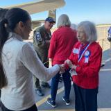 A picture of Rep. Davids greeting a senior citizen in the district.