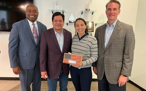 Rep. Sharice Davids receiving the U.S. Chamber’s “Advocate for American Business” award alongside Mark Garrett, John Gonzales, and Stuart Shaw.