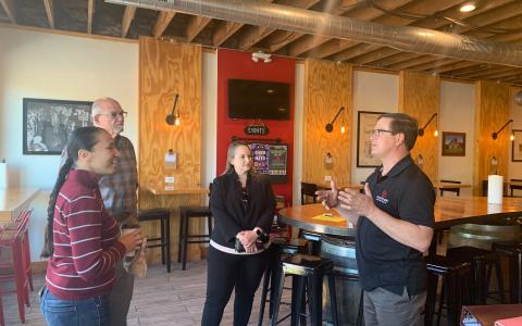 Rep. Sharice Davids visiting Transport Brewery in Shawnee during National Small Business Week.