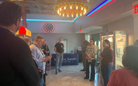 During her “Main Street Stroll,” Rep. Sharice Davids chats with Shawnee business owners at the Aztec Theatre.