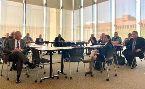 Rep. Sharice Davids with local law enforcement officers during her first fentanyl summit.