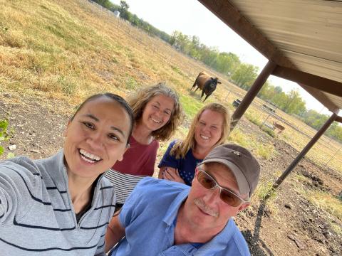 Representative Sharice Davids with Kansas dairy farmers, including Rob Leach, Lisa Leach, and Christi Ratliff.