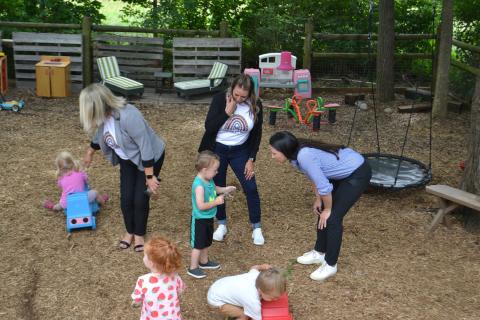 Rep. Davids with children attending Happy Campers Montessori School.