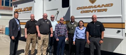 Rep. Davids with law enforcement officers at Olathe's mobile command unit