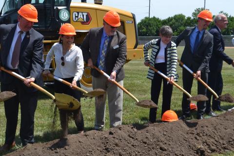 Representative Sharice Davids helps break ground on the De Soto Local Road Improvements project.