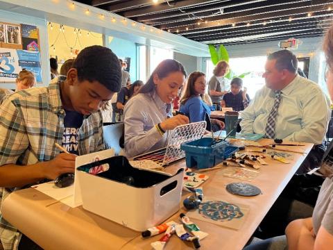 Rep. Sharice Davids participates in art project at Tyler’s House KC.