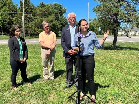 Rep. Sharice Davids with Overland Park officials after touring the 167th Street reconstruction project.
