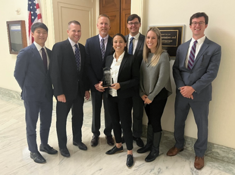 Representative Davids receiving the Shippers Coalition’s “Champion of the Shippers” award outside the Transportation and Infrastructure Committee room.