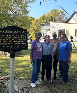 Representative Davids, Representative Cleaver, and the Webb family otuside of the former Walker School.