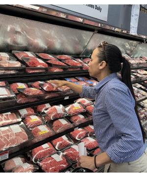 Rep. Sharice Davids grocery shopping in Roeland Park