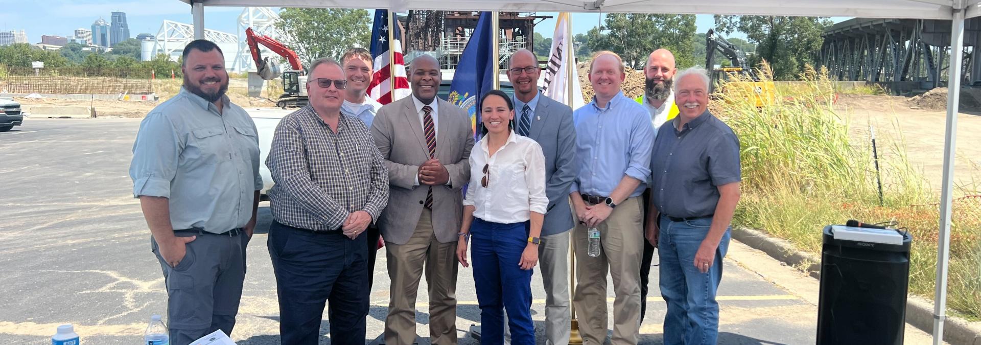Rep. Sharice Davids with city, county, and state officials celebrating the federal investment for the Kansas Avenue Bridge